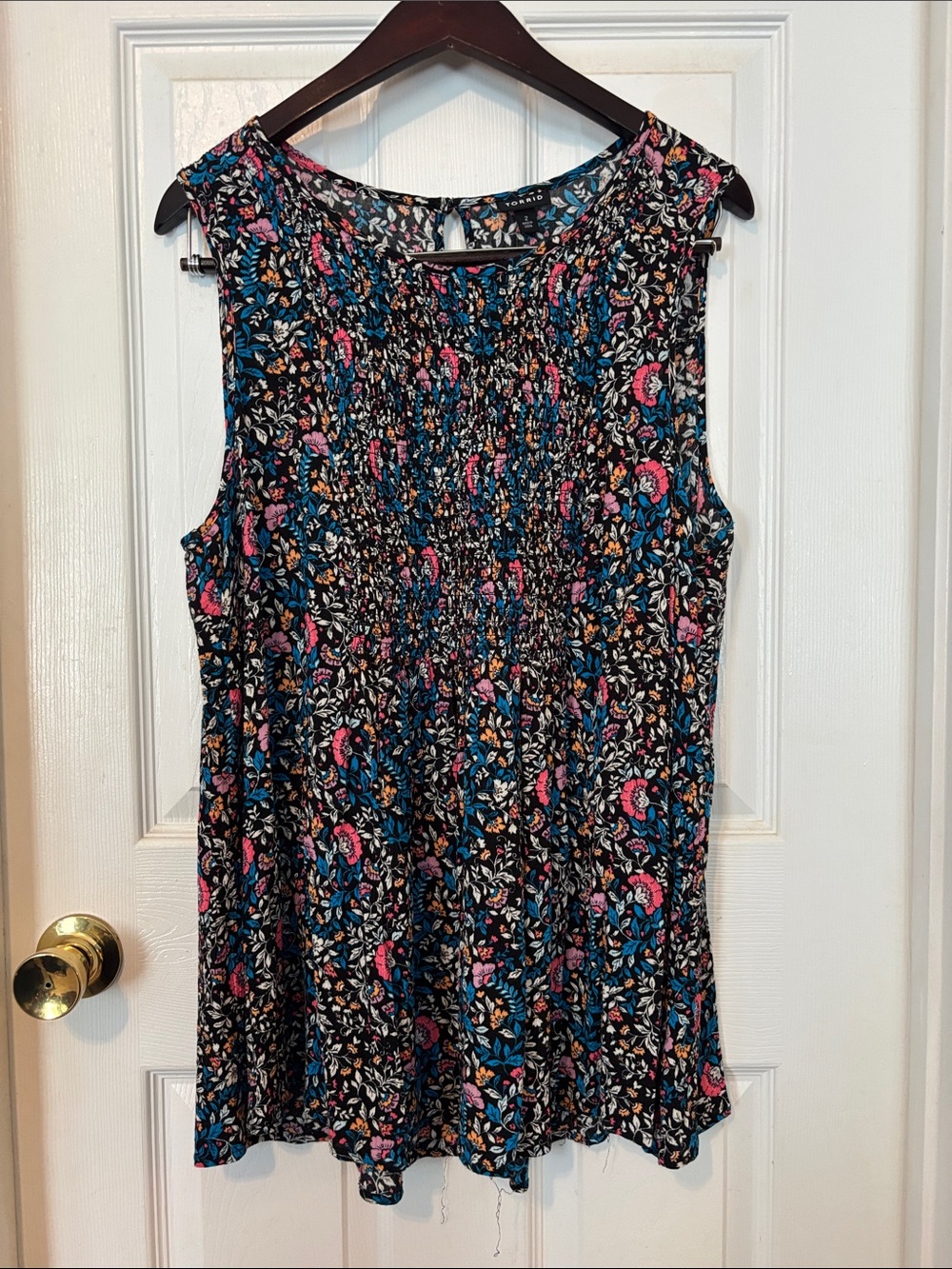Torrid Sleeveless Black Floral Smocked Top with Pink & Blue. Perfect for Summer
